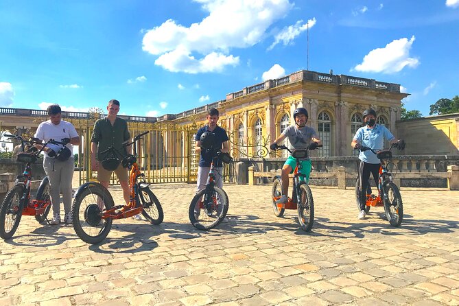 Discover Versailles on electric 2-wheelers (Yes to PRM) - Seeing the Apollo Fountain and the Market Square