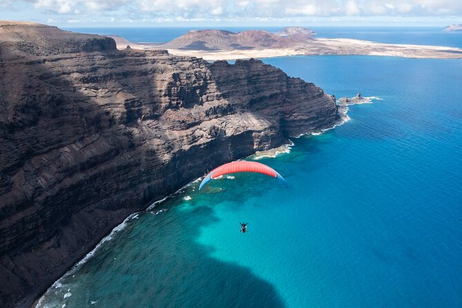 DISCOVERY FLIGHT tandem paragliding Lanzarote with pro pilot - Scenic Highlights: Lava Fields, Volcanoes, and Ocean Views