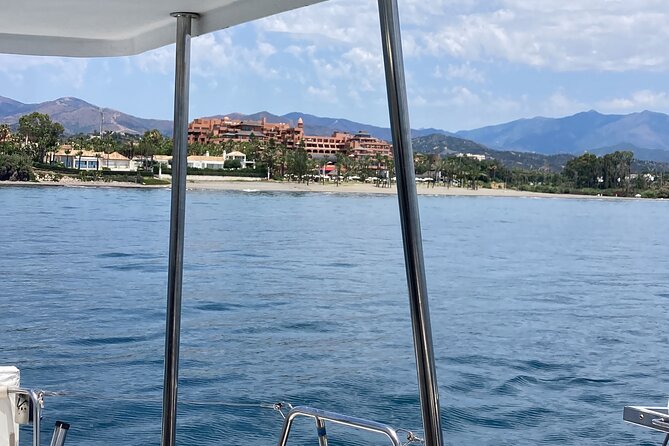 Dolphin trips on a catamaran - The Sum Up: A Relaxing Maritime Adventure in Marbella