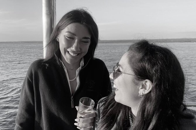 Dolphin Watching & Sunset Boat Tour With Dinner and Drinks - Sunset and Scenic Views from the Deck