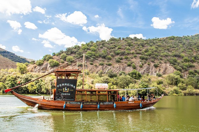 Douro Valley: private tour with lunch and wine estate all inclusive - Scenic River Cruise in a Rabelo Boat at Cais do Pinhão