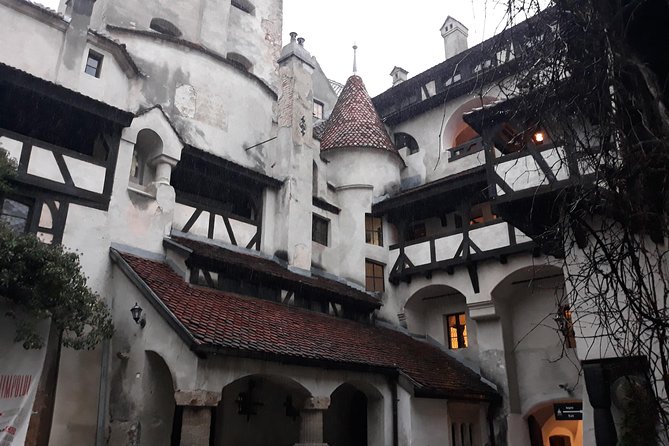 Dracula's Castle & Peles Palace Tour from Bucharest Including Brasov Old Town - Evening Return to Bucharest