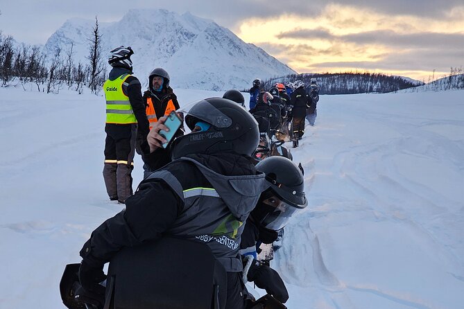 Driving Ski-Doo Snowmobile Adventure 5 Hours Photos included - The Scenic Route: Arctic Mountains and Frozen Lakes