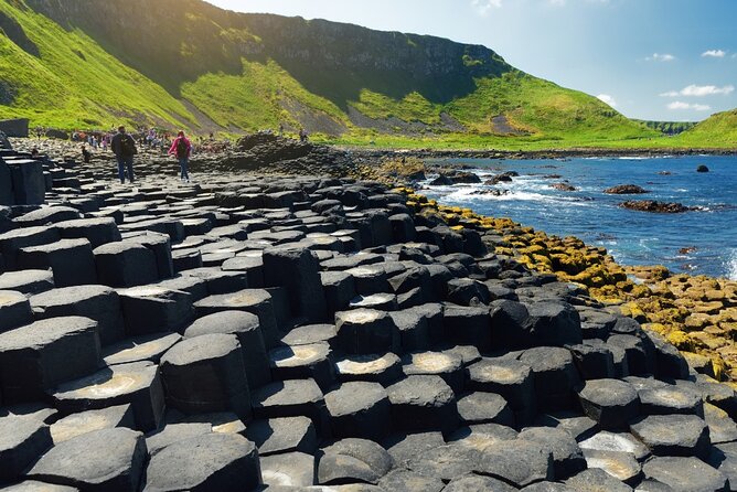 Dublin to Belfast City, Bushmills and Giant's Causeway Day Tour - Visiting Dunluce Castle at Clifftop Heights
