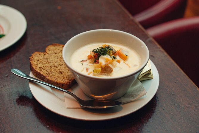 Dublin Traditional Irish 3 Course Meal Walking Tour with Local - Enjoying the First Course at a Historic Venue