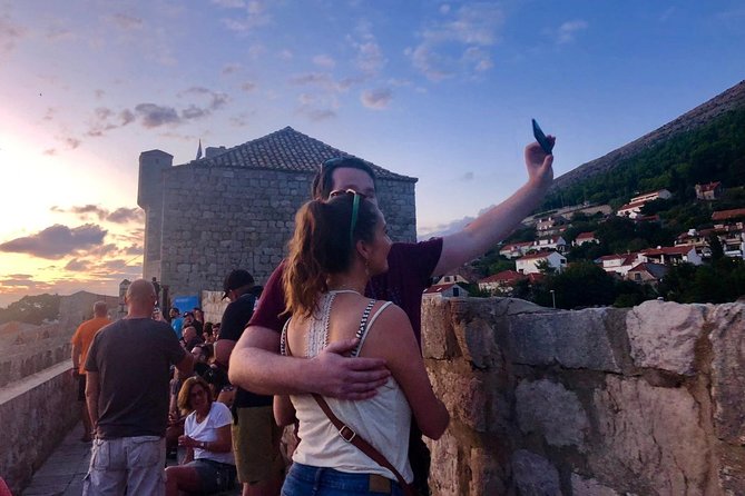 Dubrovnik City Walls Sunset Guided Tour - Sunset Viewing and Final Stop on Stradun Street