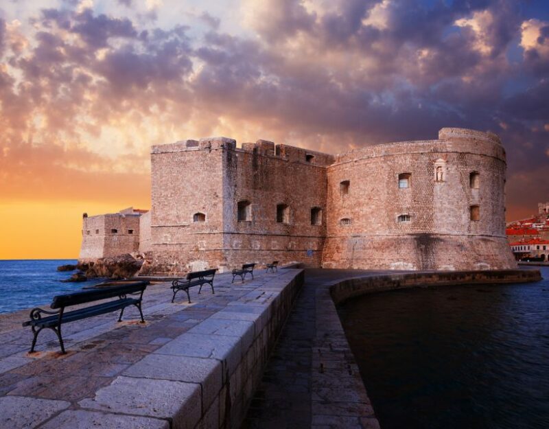 Dubrovnik: Old Town Highlights Guided Evening Walking Tour - Walking Through Dubrovnik’s Iconic Stradun in the Evening