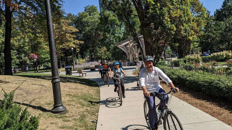 E-bike through Toronto's Dynamic Neighbourhoods - Relaxing at Trinity Bellwoods Park
