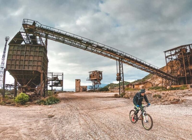 E-biking inside the mine tunnels on Monte Calamita, Capoliveri - Explore Elba’s Old Mines on an E-Bike Adventure in Tuscany