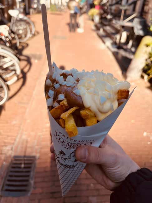 Eat & Drink Amsterdam: A Cozy Culinary Tour with Local Beer - Herring, a Dutch Seafood Staple