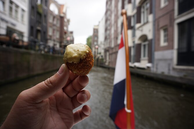 Eating Amsterdam: Food Tour and Canal Cruise - Canal Cruise on a Vintage Boat: A Scenic and Informative Ride