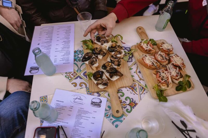 Eating Palermo: Evening Food & Wine Tour - Tasting Sicilian Wines in a Lively Atmosphere