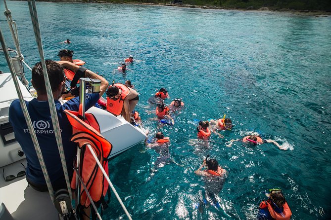 El Cielo Beach Snorkeling Adventure by Catamaran - Food, Drinks, and Relaxation on Board