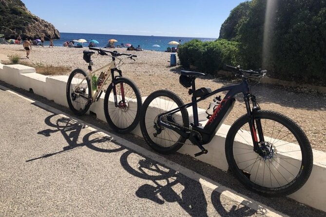 Electric bicycle route Cala Granadella -Cala Moraig - Visiting Mirador de Llevant and Notable Coastal Landmarks