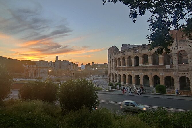 Elegant Rome by night tour and dinner in a local restaurant - Walking Through Roman History at Via dei Fori Imperiali and the Colosseum Belvedere