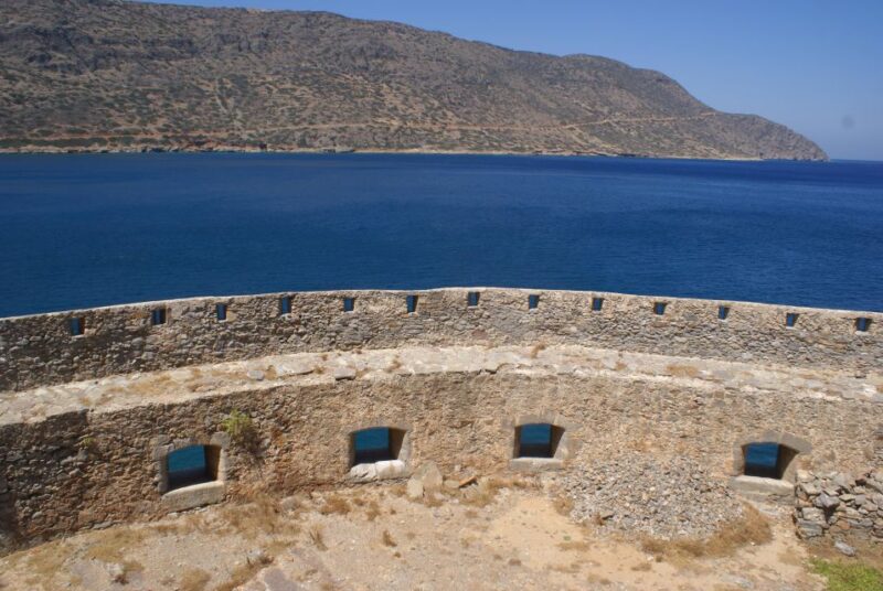 Elounda: Spinalonga Guided Boat Tour with BBQ and Swimming - Visiting the Secluded Kolokytha Beach