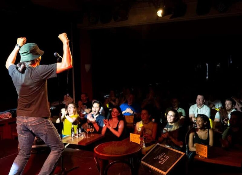 English Stand-Up Comedy Show with Free Pizza and Free Shots - The Rotating Lineup of International Comedians