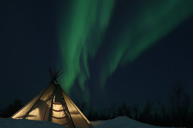 Enjoy the Aurora show on top of the mountain inc tipi dinner - The Sum Up: A Unique Arctic Adventure with Authentic Comfort