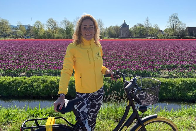 Enjoy the tulip fields by bicycle with a local guide! Tulip bike tour! - Inside De Tulperij Flower Greenhouse