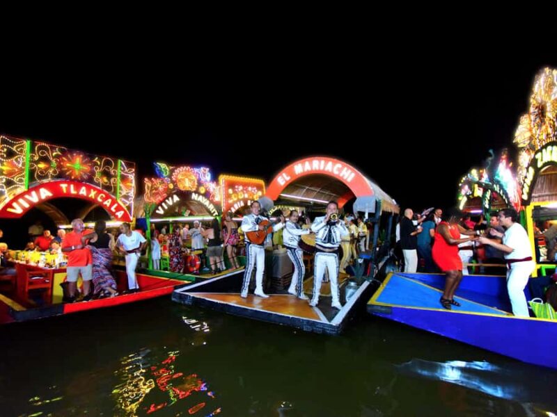 Entrance to Xoximilco Night Park - Live Music, Performers, and Interactive Entertainment