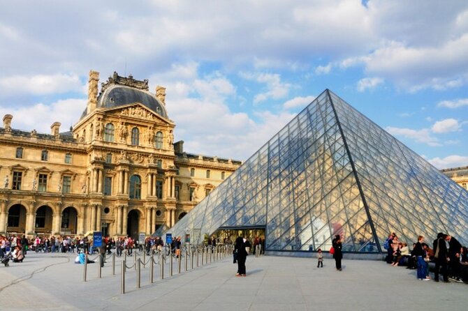 Escorted Paris Day Trip: Eiffel Tower, Notre Dame & Lunch Cruise - Scenic Lunch Cruise on the River Seine with a Three-Course Meal