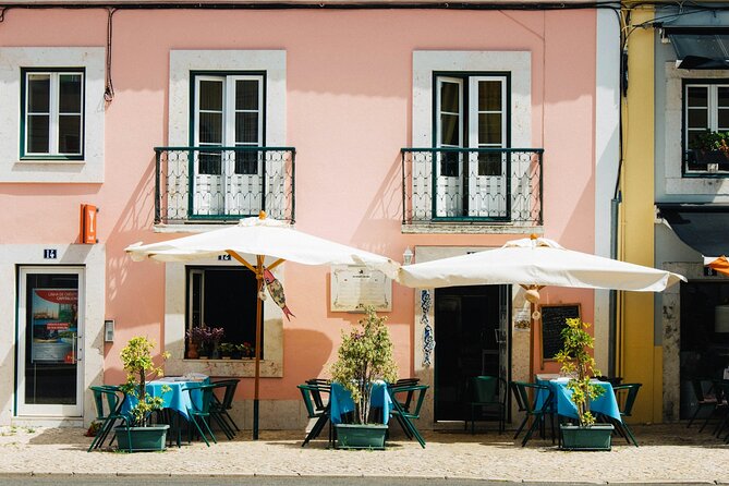 Essential Lisbon Highlights Walking Tour - Discovering Praça Luís de Camoes and Bairro Alto