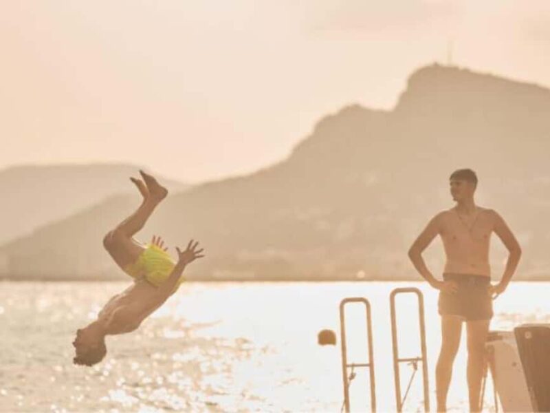 Estartit: Sunset Cruise with Snorkeling and a Drink - Savoring a Glass of Wine on Deck