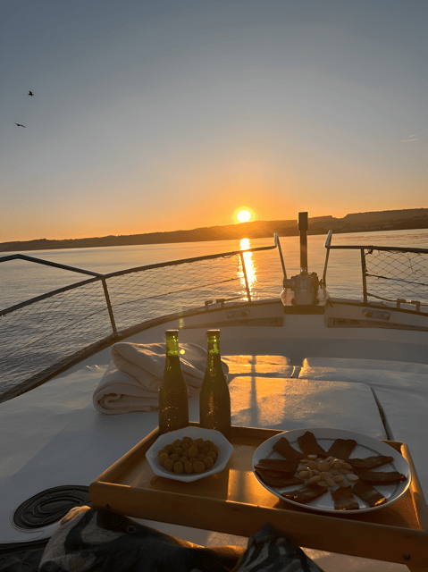 Estepona: Dolphin Searching Sunset Cruise with Drink & Snack - The Sunset Experience from the Water