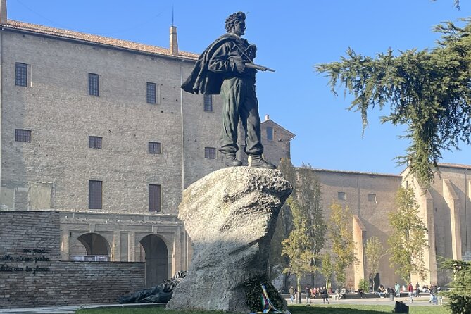 Europes Culinary Capital: A Self-Guided Audio Tour in Parma - Strolling Through Piazza Garibaldi and Local Atmosphere