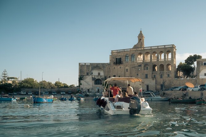 Exclusive 1,5-Hour Private Boat Tour in Polignano a Mare - Admiring the Imposing Scoglio dellEremita