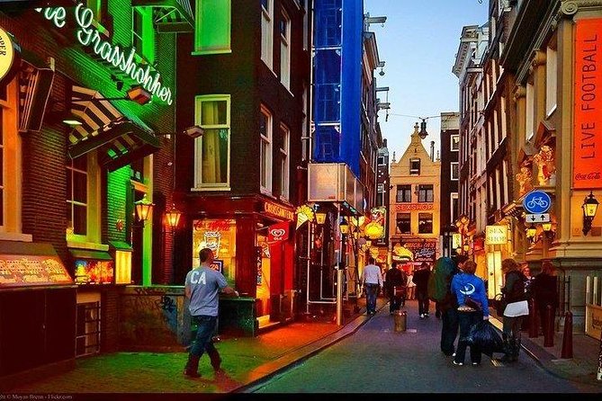 Exclusive Amsterdam Red Light District tour with a drink - Starting Point and Meeting Details at Prins Hendrikkade