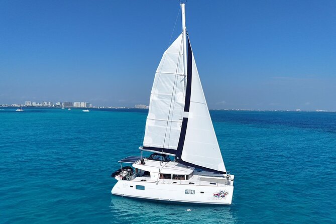 Exclusive Beach Club Catamaran Isla Mujeres Tour - Free Time at Isla Mujeres: Explore or Relax