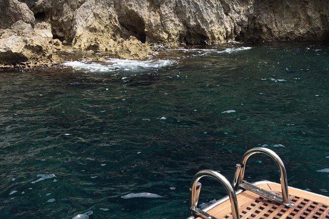 Exclusive Boat Tour to Capri with Swim Stop and Aperitif - Exploring the Blue Grotto and Surrounding Caves