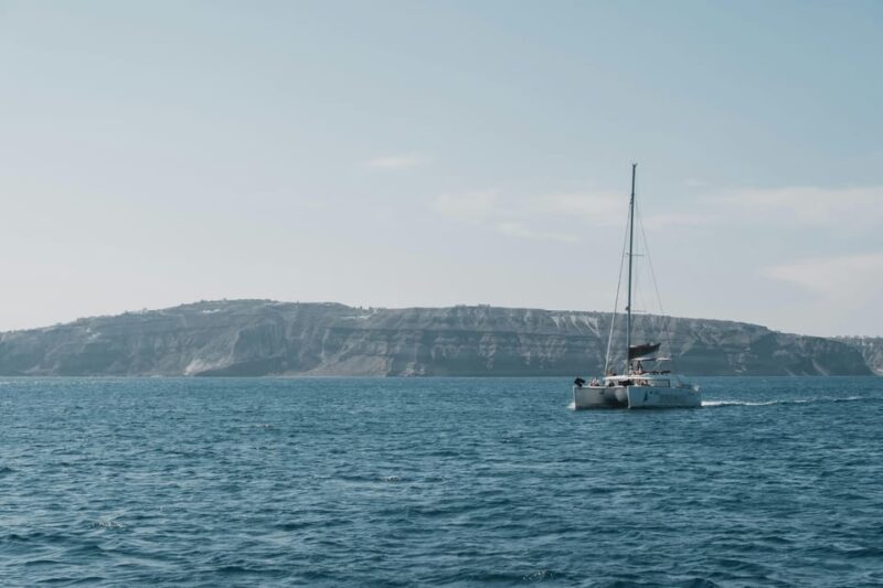 Exclusive Catamaran Sailing Adventure, BBQ & drinks on board - Sailing Through Santorini’s Iconic Caldera on a Lagoon Catamaran