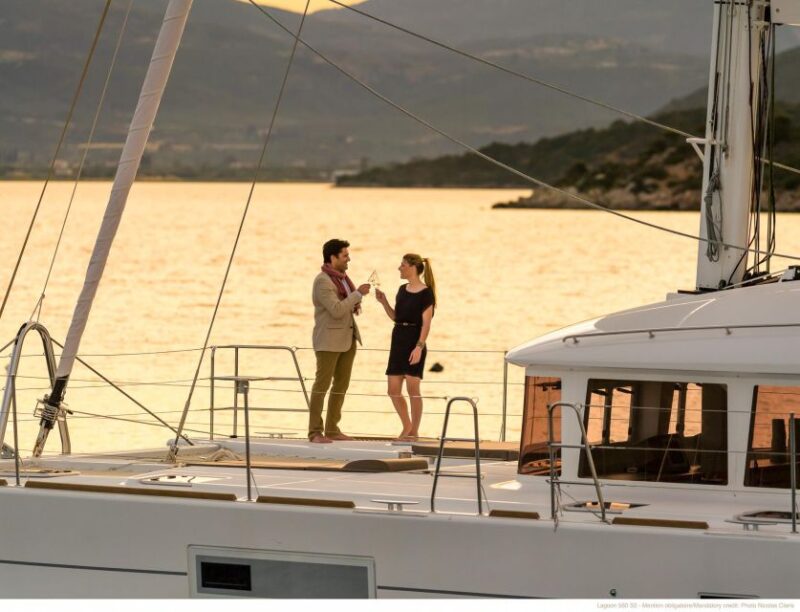 Exclusive Catamaran Sailing Adventure, BBQ & drinks on board - Sunset Sailing Past Oia and Thirassia Island