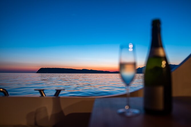 Exclusive Dubrovnik Sunset Cruise with Cocktail at the Cave Bar - Key Points