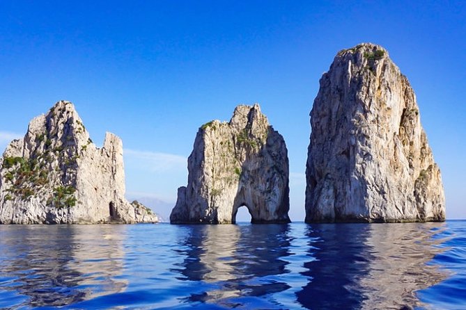 Exclusive Private VIP Capri Boat Experience on a Gozzo - Docking at Capri for Land Exploration and Lunch