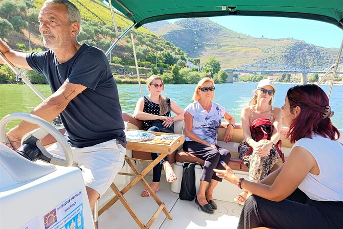 Exclusive Tour Porto-Douro Valley-Wine Tasting/Lunch/Boat Tour - Scenic Boat Tour Through the Douro River Valley