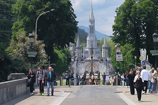 Experience Lourdes: Guided Tour & Convenient Transport - Key Points