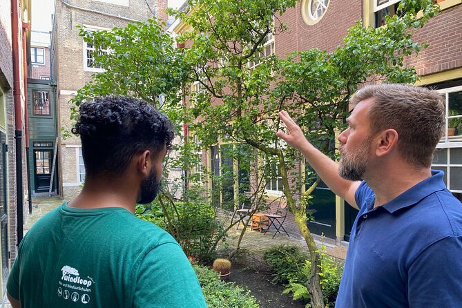 Explore hidden streets with friends - Private Tour - Passing by the Anne Frank House and Westerkerk