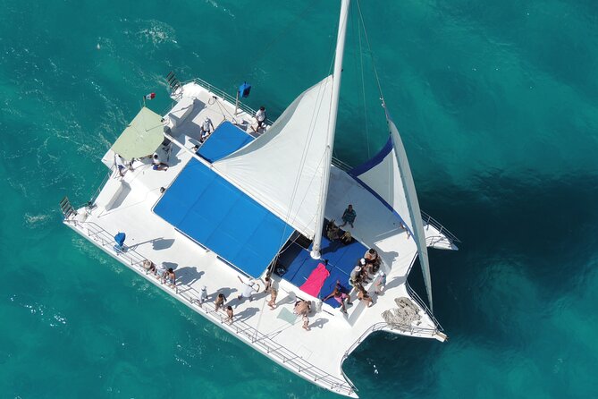 Explore Isla Mujeres Catamaran Snorkeling and Lunch Adventure - Snorkeling Adventure and Reef Exploration
