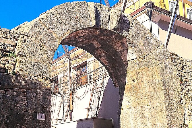 Explore layers of Pula's History in German or English - The Iconic Pula Arena: A Roman Wonder