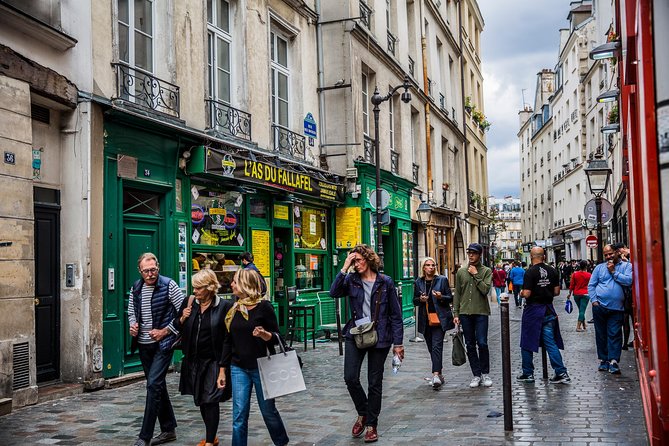 Explore Le Marais like a local - Private walking tour - Visiting the National Archives Garden and Private Mansion