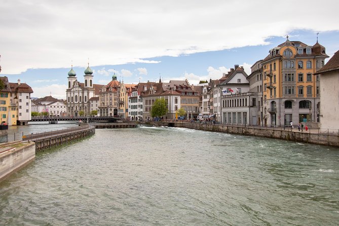Explore Lucerne in 60 minutes with a Local - Walking the Iconic Chapel Bridge and Its Old Paintings