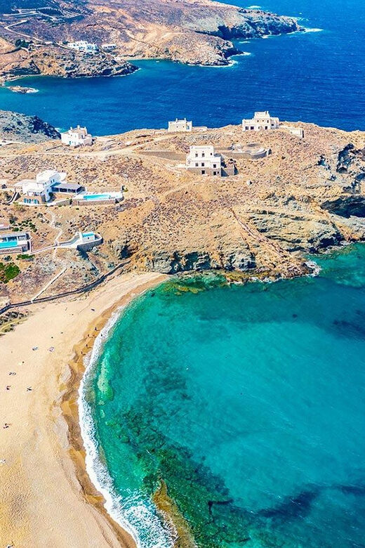 Explore Mykonos in Style with a Luxury Mini Van Tour - Relaxing at Spilia Agia Anna Beach