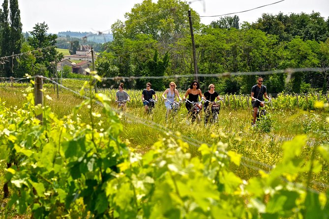 "Explore Saint-Émilion on e-Bikes: Small Group, half-Day Tour" - Scenic Village and Countryside Views