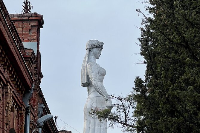 Explore Tbilisi Full Day Tour ( 3KM stroll rest by the car) - The Unique Clock Tower by Rezo Gabriadze