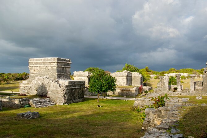 Explore the Tulum ruins, incredible cenotes and a famous sculpture. - Pickup and Transportation from Cancun Hotels