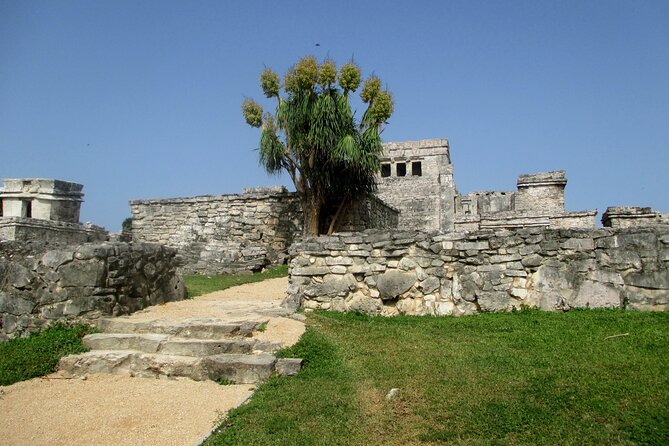 Explore the Tulum ruins, incredible cenotes and a famous sculpture. - Lunch at a Traditional Mexican Restaurant