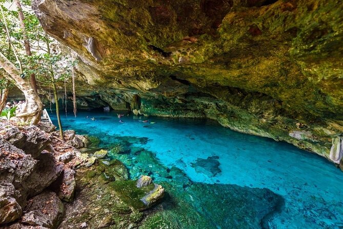 Explore the Tulum ruins, incredible cenotes and a famous sculpture. - Small Group Experience and Guided Commentary